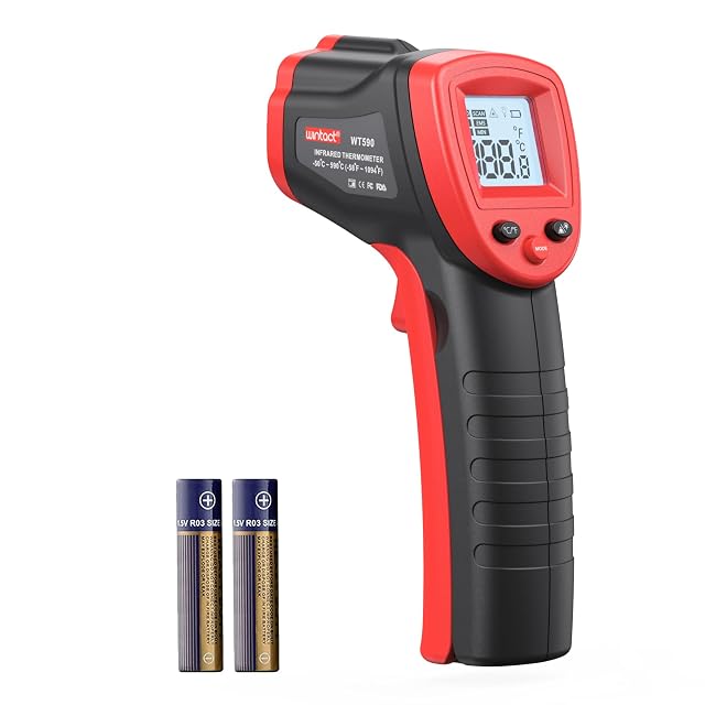 Wintact WT320 Infrarot-Thermometer auf einen Heizkörper gerichtet, Laserpunkt sichtbar